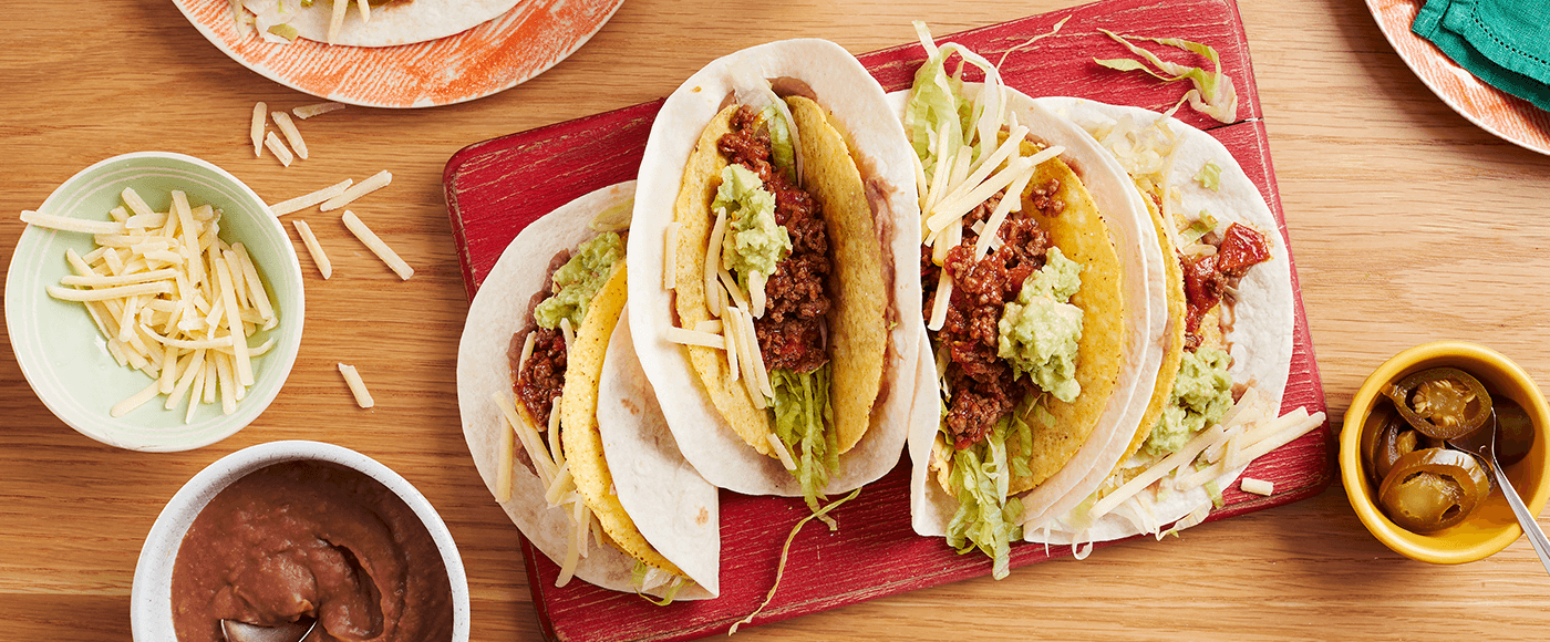 double layer beef tacos with cheese & sauce